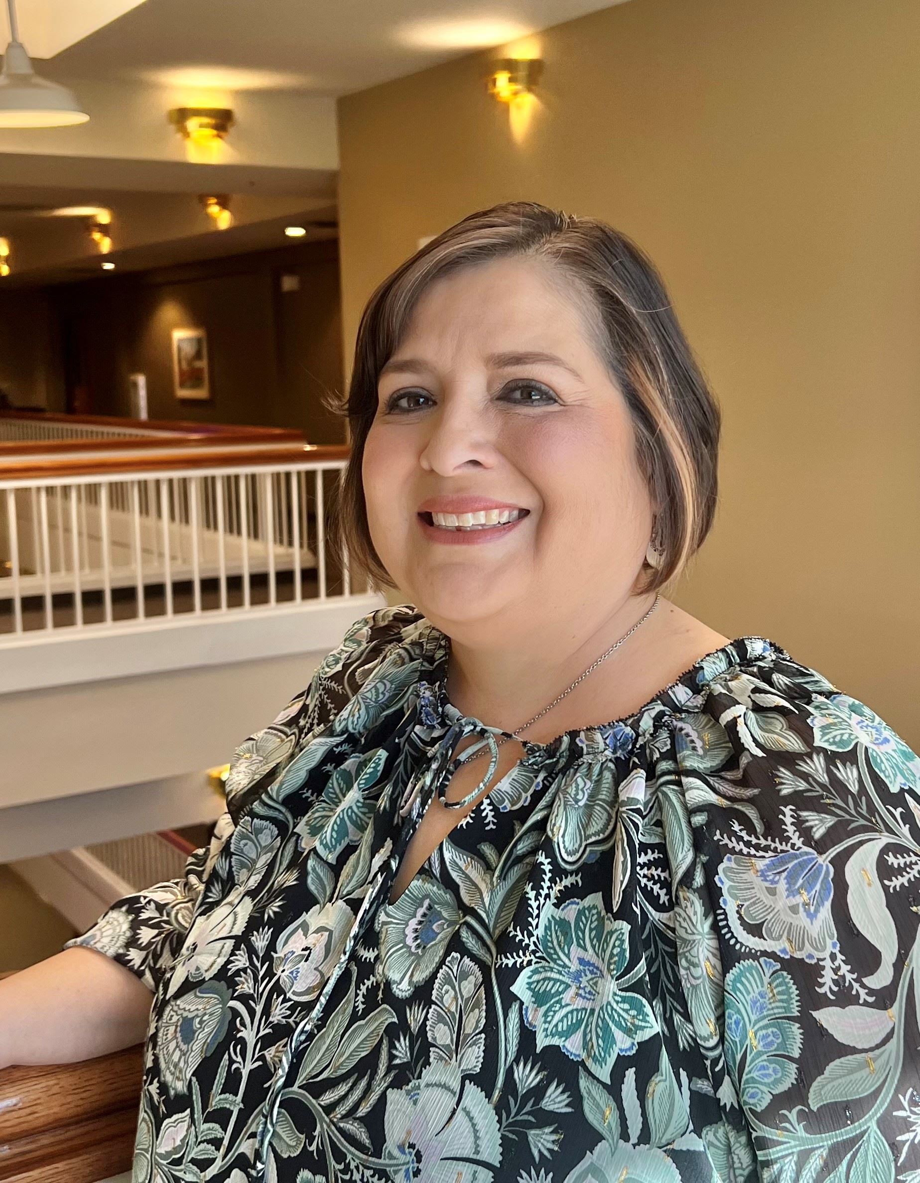 NM Transit Association Director Melissa Drake looking at the camera and smiling