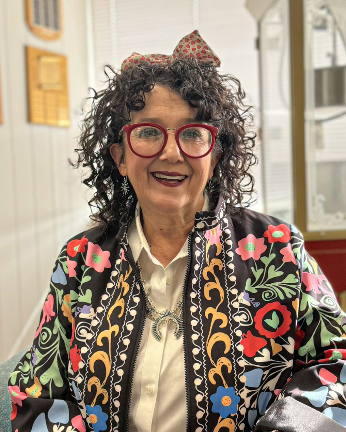 Picture of New Mexico resident Rhona Esipnoza at her office in Belen