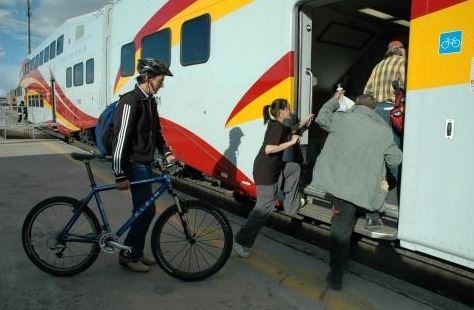 A Passenger Boarding Bike on the Train