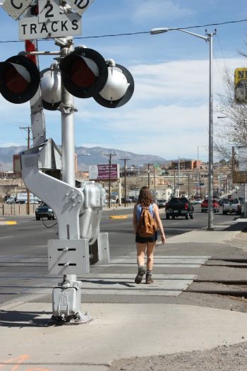 Girl Crossing a Rail Tracks
